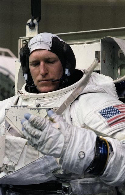 NASA image: Astronaut Sam Gemar, wearing EMU, prepares for training in WETF