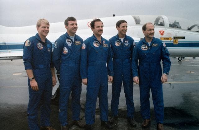 NASA image: STS-26 crew poses for group portrait at Ellington Field prior to departure