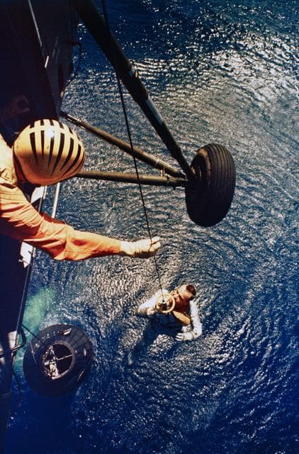 NASA image: Astronaut Alan Shepard is rescued by helicopter at end of MR-3 flight