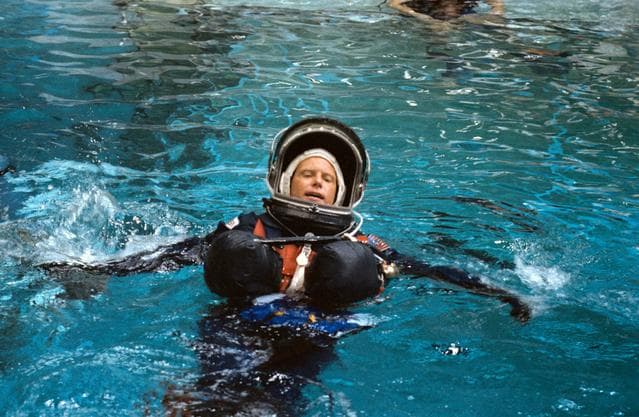 NASA image: STS-26 MS Nelson during Crew escape system (CES) testing in JSC WETF Bldg 29