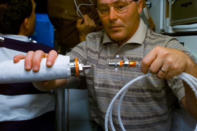 NASA image: Inflight maintenance of GIRA cable
