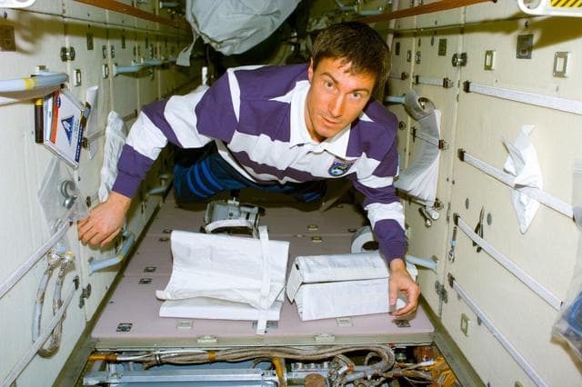 NASA image: Krikalev in FGB during repair of battery recharger