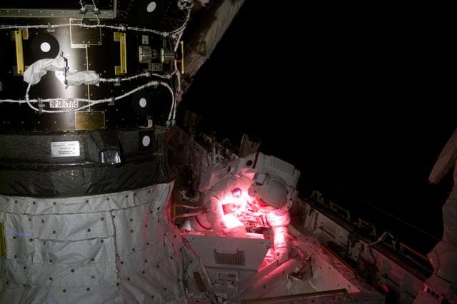 NASA image: Ross opens Tool Stowage Assembly on ODS support structure