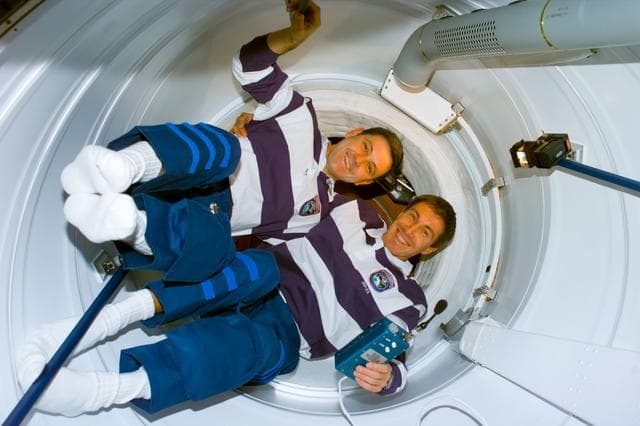 NASA image: Cabana and Krikalev prepare to open the hatch to the FGB/Zarya module