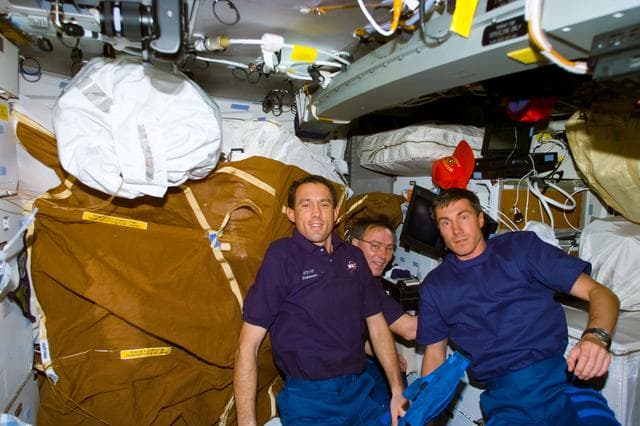 NASA image: Newman, Krikalev and Ross on Endeavour's middeck