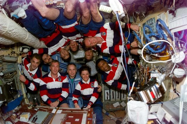 NASA image: STS-89 and Mir 24 crewmembers pose on Base Block