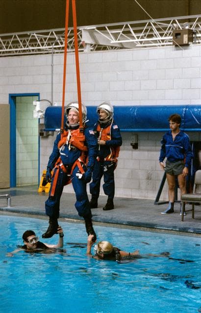 NASA image: STS-35 Commander Brand is suspended over JSC WETF pool during egress exercise