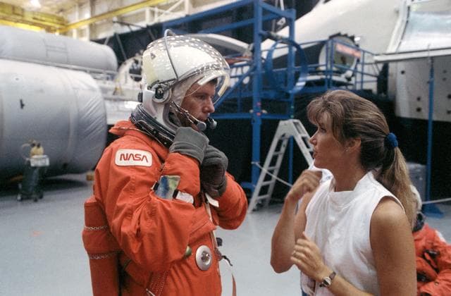 NASA image: STS-40 Commander O'Connor with trainer outside JSC's Full Fuselage Trainer
