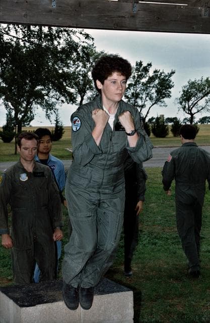 NASA image: ASCAN Helms simulates parachute jump during VAFB training exercises