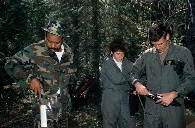 NASA image: ASCANs Harris, Helms, and McArthur during survival training at Fairchild AFB