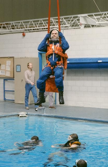 NASA image: STS-39 MS Hieb is suspended over JSC's WETF Bldg 29 pool via harness