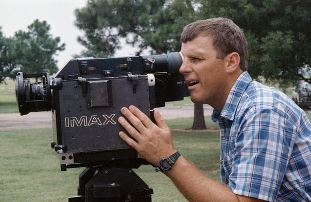 NASA image: STS-42 Pilot Oswald uses the IMAX camera system (ICS) during JSC training