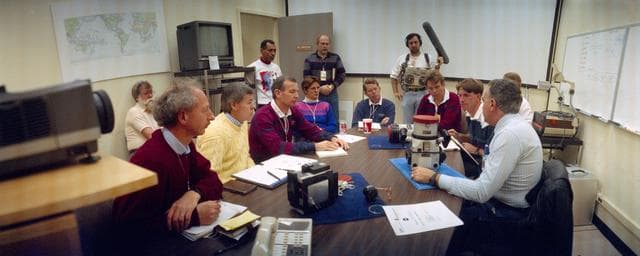 NASA image: STS-45 crewmembers during LINHOF camera briefing in JSC's Bldg 4 rm 2026A