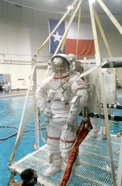NASA image: STS-57 MS3 Wisoff in EMU is lowered into JSC's WETF pool for EVA simulation