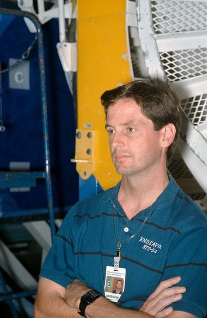 NASA image: STS-54 MS2 Harbaugh listens to instructions in JSC's WETF Bldg 29