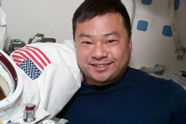 NASA image: Portrait views of STS-92 crewmember Mission Specialist Leroy Chiao smiling for the camera.
