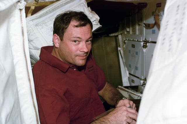 NASA image: Various portrait views of STS-92 crewmember Michael Lopez-Alegria smiling for the camera.