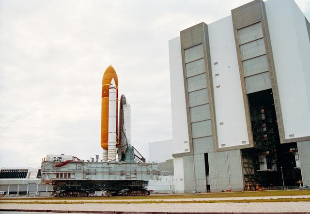 NASA image: STS-55 Columbia, OV-102, mated to the ET and SRBs is rolled out of KSC's VAB