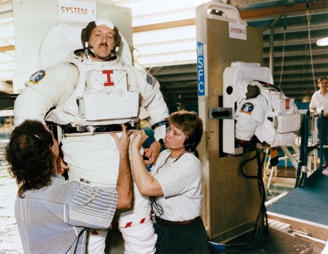 NASA image: STS-61 crewmembers participate in neutral buoyancy training at MSFC