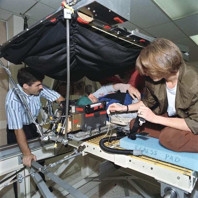 NASA image: STS-58 crewmembers participate in baseline data collection