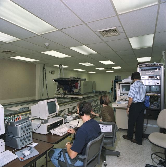 NASA image: STS-58 crewmembers participate in baseline data collection