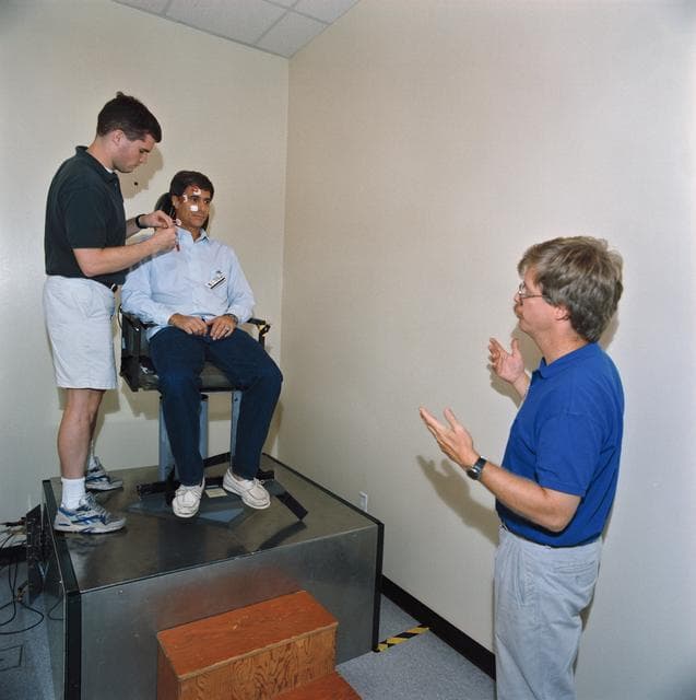 NASA image: STS-58 crewmembers participate in baseline data collection