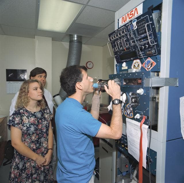 NASA image: STS-58 crewmembers participate in baseline data collection