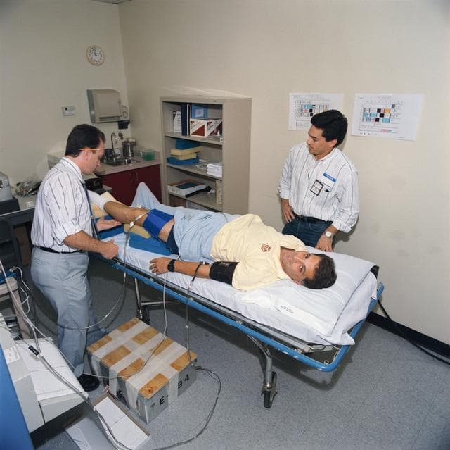 NASA image: STS-58 crewmembers participate in baseline data collection