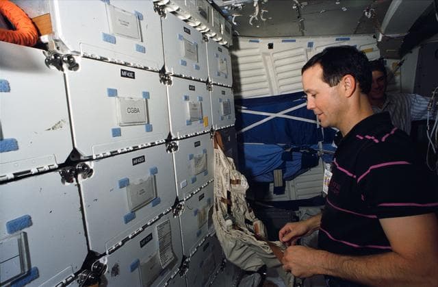 NASA image: Astronauts Allen and Thuot during Extravehicular activity training in CCT