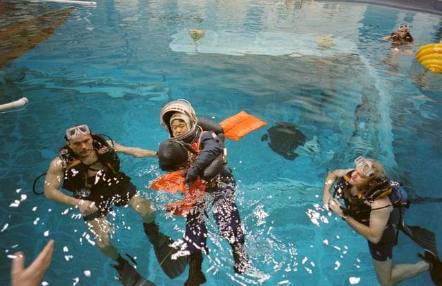 NASA image: STS-65 Payload Specialist Mukai floats in WETF pool during bailout training