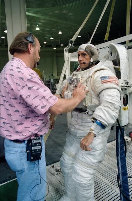 NASA image: STS-65 Mission Specialist Thomas in EMU prepares for WETF contingency EVA