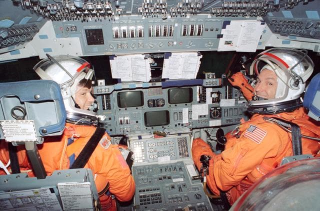 NASA image: Astronauts McMonagle and Brown on flight deck mockup during training