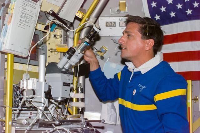 NASA image: BDND - MGBX - Thomas with microscope at glovebox in Spacelab