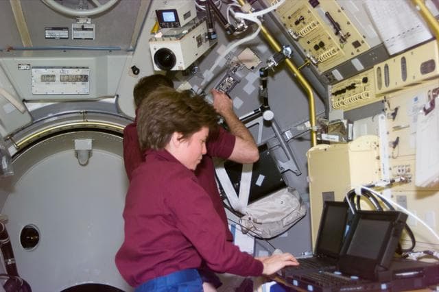 NASA image: Payload commander Voss in Spacelab with PGSC