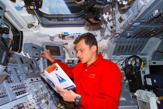 NASA image: Duque at RMS controls on aft flight deck