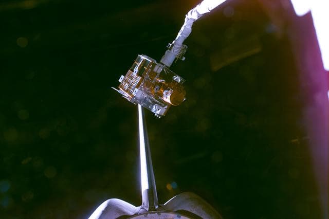 NASA image: Various views of the capture of the Spartan satellite