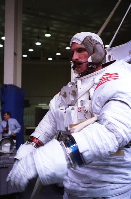 NASA image: Astronauts Greg Harbaugh and Joe Tanner suit up for training in WETF