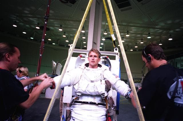 NASA image: Astronauts Michael Foale and Jerry Linenger training with Russian Orlan suit