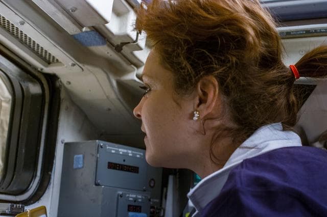 NASA image: Tamara Jernigan looks out of aft flight deck windows after rendezvous with ISS