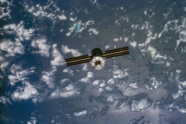 NASA image: View of the ISS stack as seen during the fly-around by the STS-96 crew