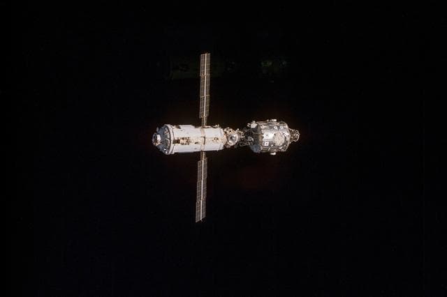 NASA image: View of the ISS stack as seen during the fly-around by the STS-96 crew