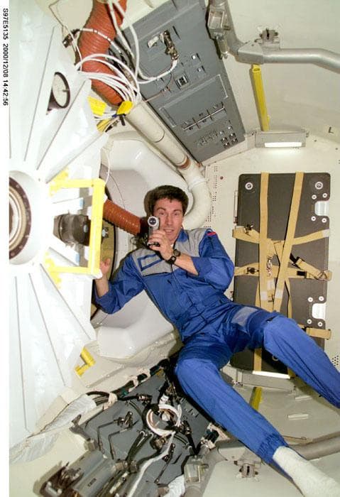 NASA image: Krikalev in docking compartment with camera
