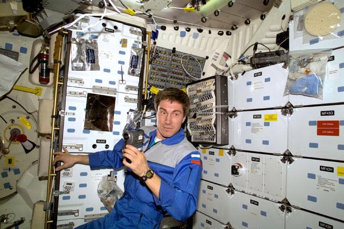 NASA image: Krikalev on middeck with camera