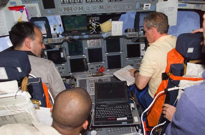 NASA image: STS-98 crewmembers prepare for rendezvous and docking with ISS