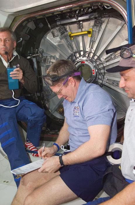 NASA image: Astronauts Cockrell, Shepherd and Polansky prior to hatch opening