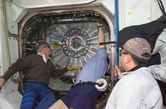 NASA image: Astronauts Cockrell, Shepherd and Polansky during hatch opening