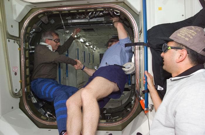 NASA image: Astronauts Cockrell, Shepherd and Polansky during hatch opening