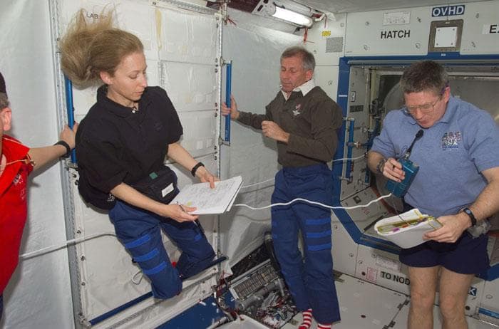 NASA image: MS Ivins and Astronaut Shepherd at work in Destiny module