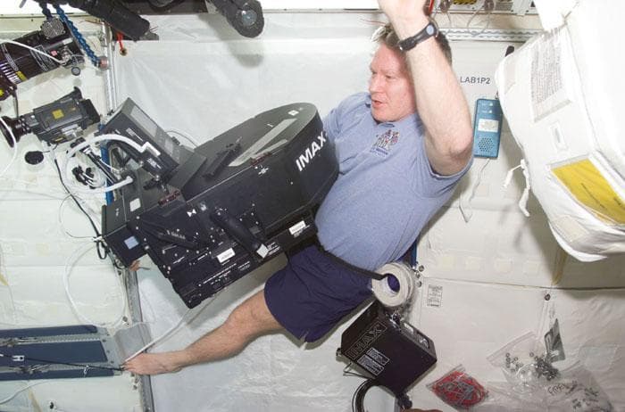 NASA image: Expedition One CDR Shepherd with IMAX camera