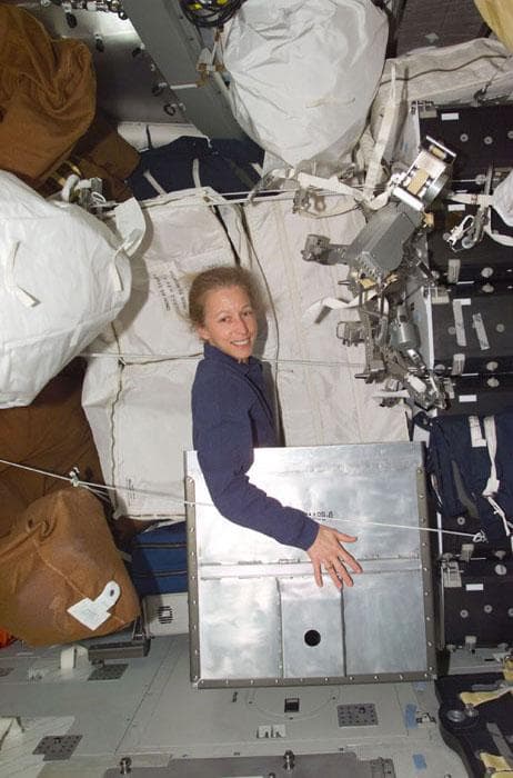 NASA image: Ivins inside of Vozduck case in Atlantis middeck